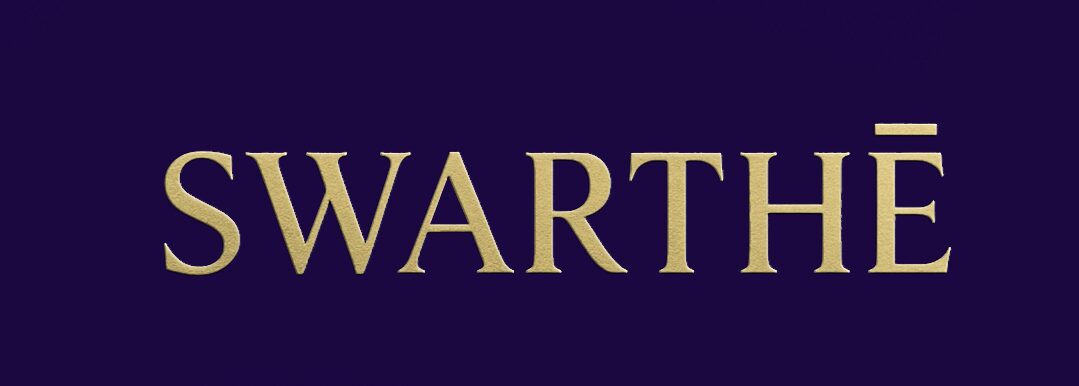 Partial view of the word 'WART' in gold letters on a dark background.